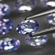 Glittering 5.28ct bright blue violet Tanzanite set