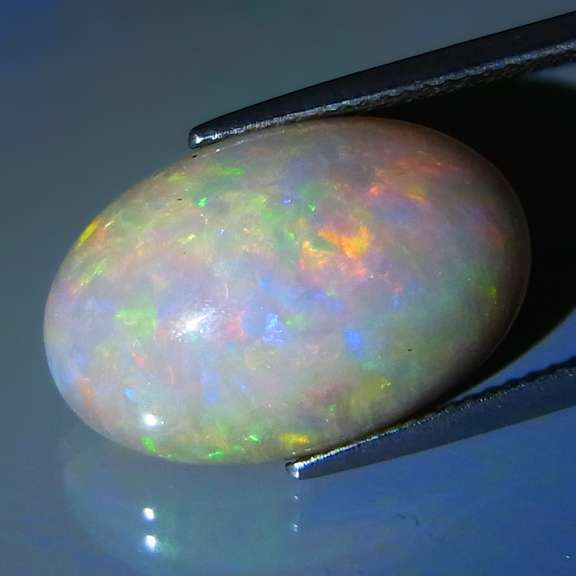 Exciting 9.59ct full body smoldering GRAY Welo Opal