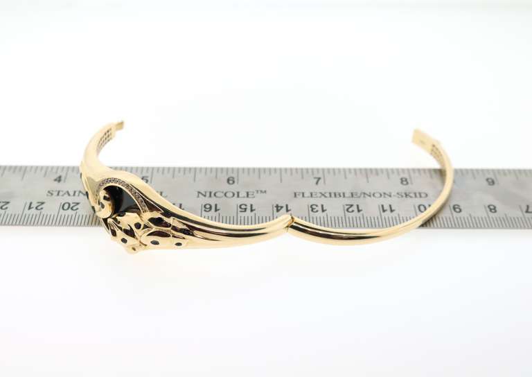 Tempting Handmade Italian 14k Gold and Onyx Panther Bangle Bracelet rimmed with Cubic Zirconias