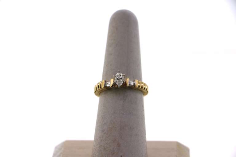 Genius Oval Diamond Side Stone Ring with 14k Gold