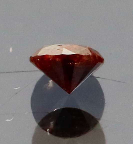 Eye catching 0.22ct round cut red Diamond solitaire