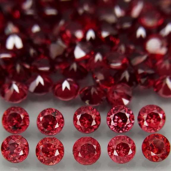 Incredible 7.11ct open color Pyrope Garnet set