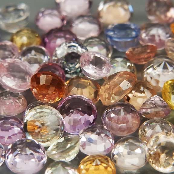 Vibrant 9.93ct diamond cut Ceylon Sapphire set