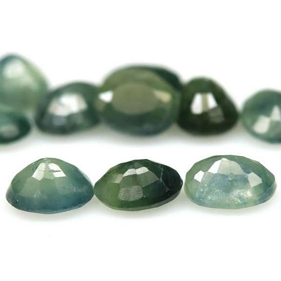 Heated only! 5ct green Sapphire set