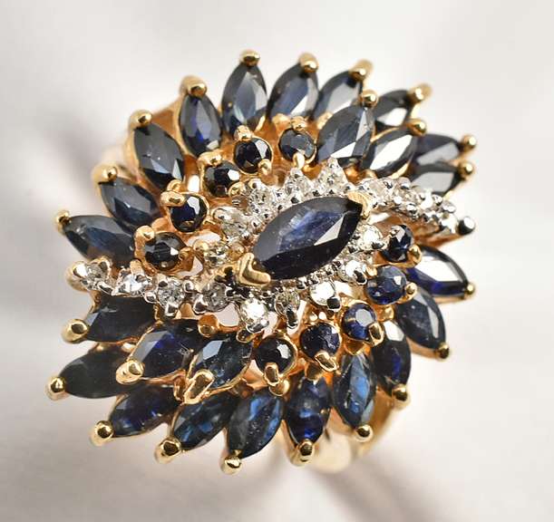 Stylish Pinwheel Cluster of Sapphires Ring