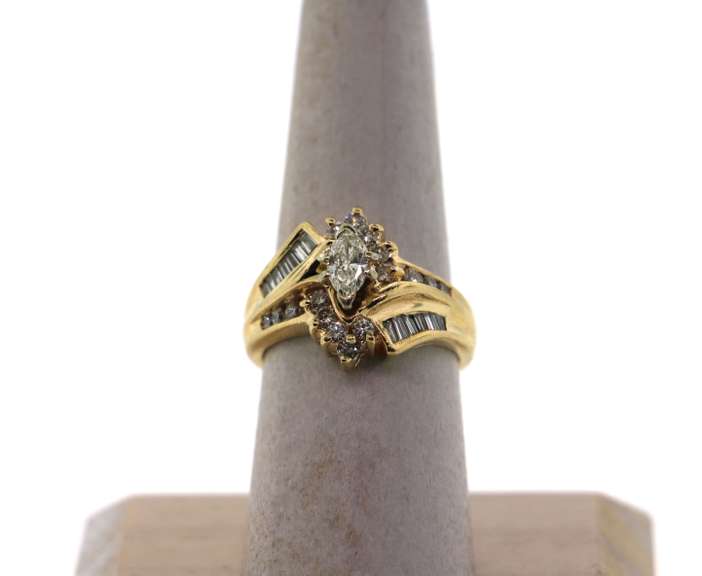 Dynamic 14k Gold Halo Diamond Ring with Baguette Diamonds