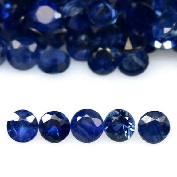 Stunning heated only 5.53ct ink blue Sapphire set