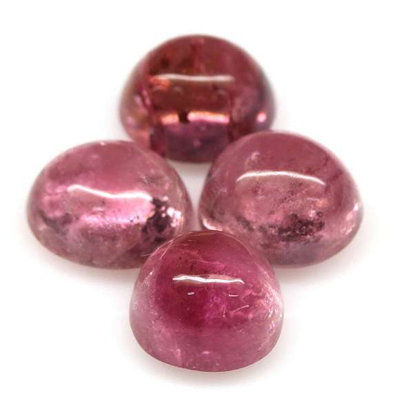 Dynamic 7.65ct Pink Tourmaline cabochon set