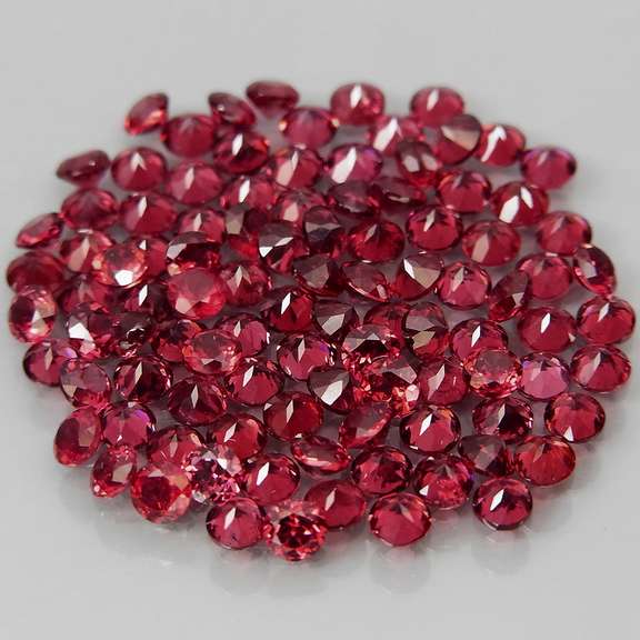 Amazing 7.01ct round cut top violet red Garnet set