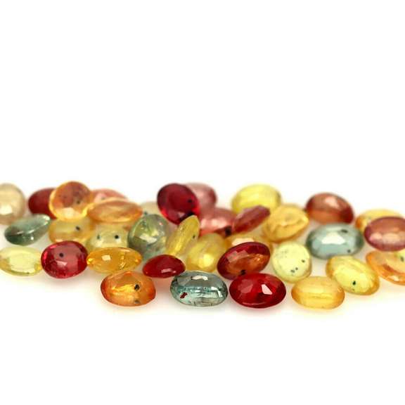Heated only! 6.75ct fancy color Sapphire set