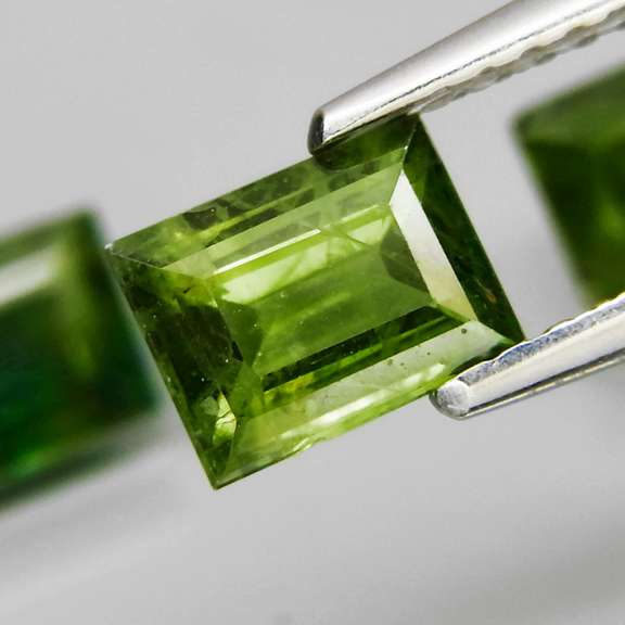 Exotic 2.99ct 3pc matched baguette cut green Sapphire set