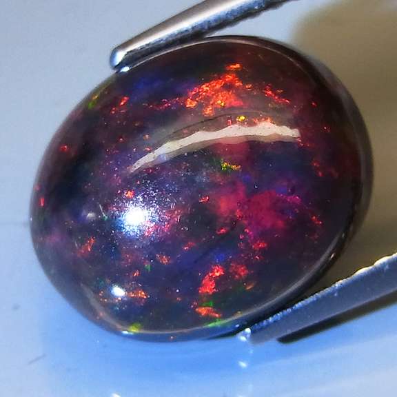 What? Yes! 3.95ct full body flashing Black Opal