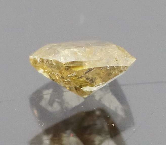 Sparkling .35ct cushion cut yellow Diamond