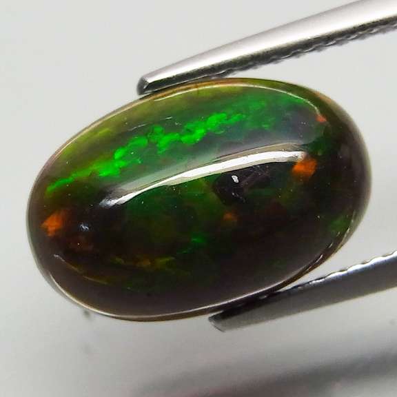 Captivating 2.56ct floral flashing Black Opal