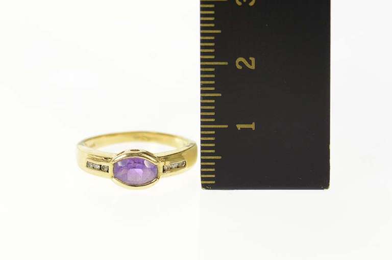 14K Yellow Gold Oval Amethyst Diamond Channel Accent Ring