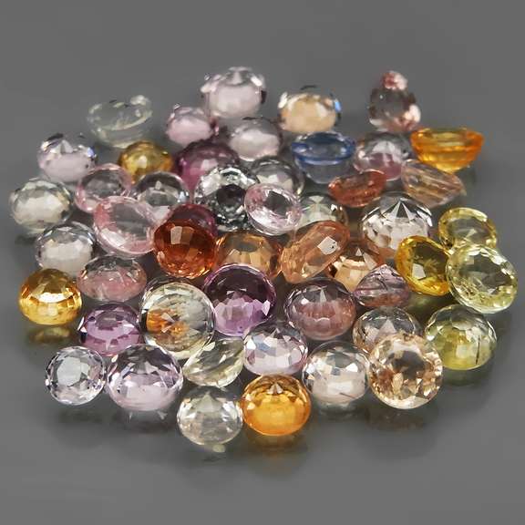 Vibrant 9.93ct diamond cut Ceylon Sapphire set