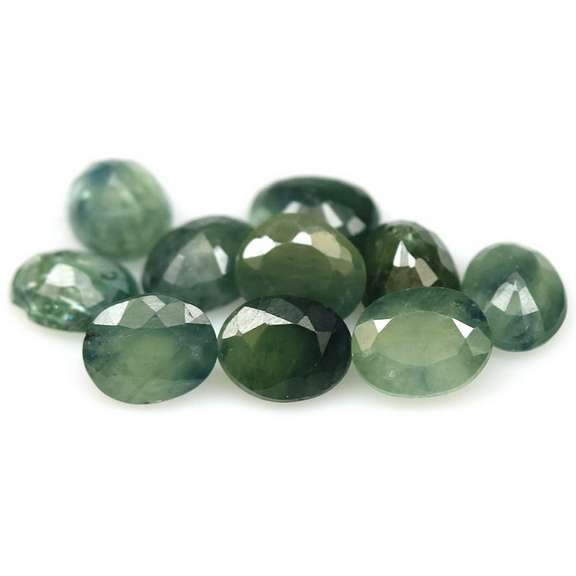 Heated only! 5ct green Sapphire set