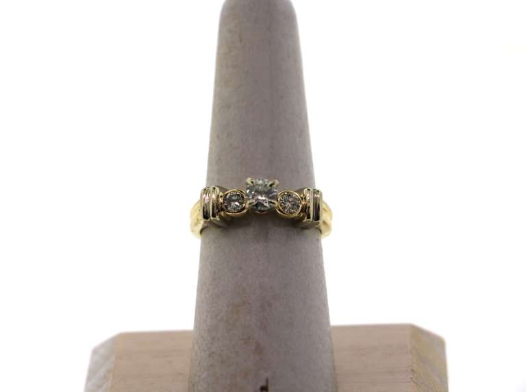 Regal Three Stone Diamond Ring with 14k Gold