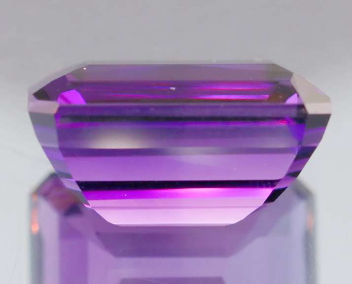 32.47ct emerald cut purple created Amethyst