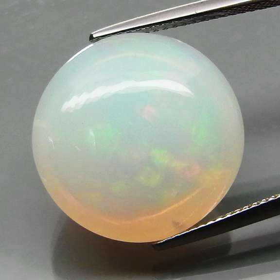 Huge! 18.31ct full body flashing Welo Opal