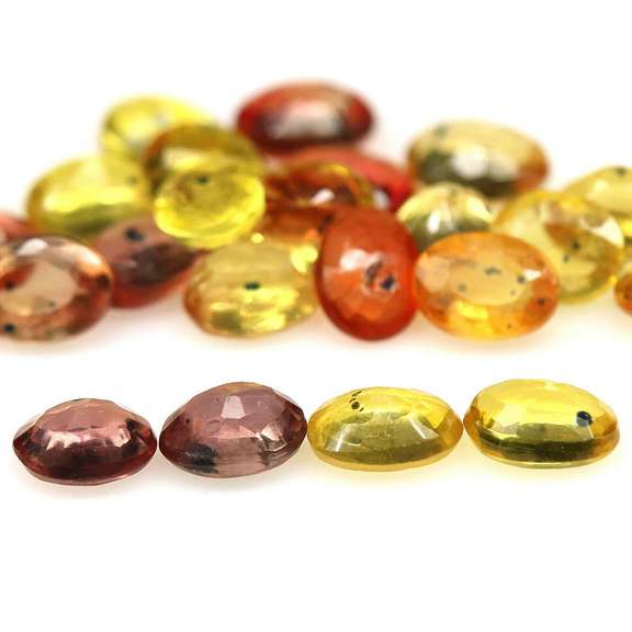 8.29ct heated only Autumn leaves Sapphire set