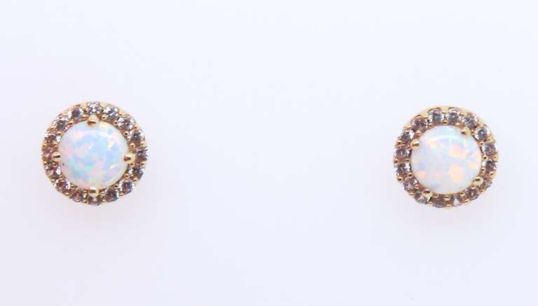 Beautiful Synthetic and Opal Yellow Gold Stud