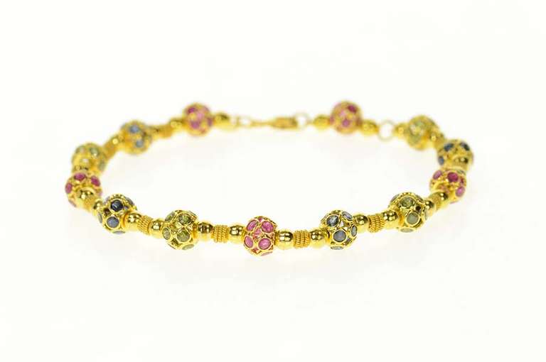 18K Yellow Gold Ruby Peridot Sapphire Encrusted Ornate Bracelet