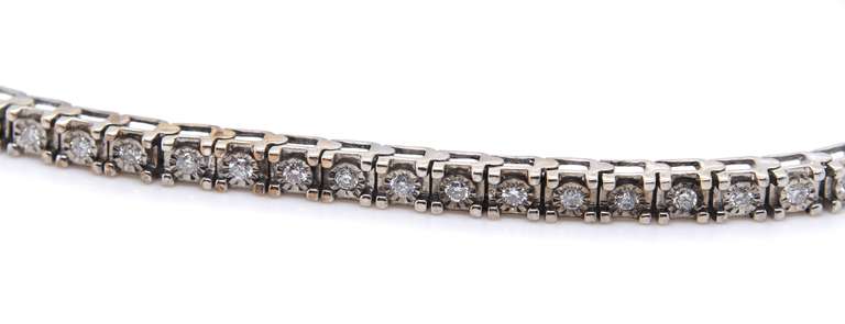 Elegant White Gold Illusion Set Diamond Tennis Bracelet