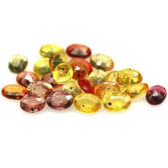 8.29ct heated only Autumn leaves Sapphire set