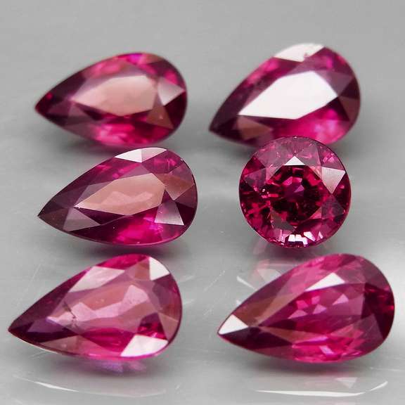 Mixed cut 9.46ct premium cherry pink Rhodolite Garnet set