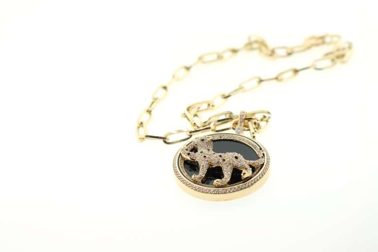 Glimmering 14k Gold Handmade Italian Panther Necklace studded with Cubic Zirconias against Pure Onyx