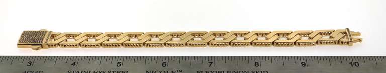 Contemporary 14k Gold Handmade Italian Curb Chain Bracelet studded with Cubic Zirconias
