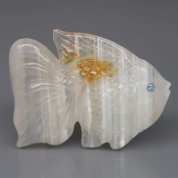 Gorgeous 34.87ct striped Agate and Sapphire carving