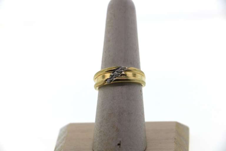 Beautiful 14k Gold Ring split by Diagonal Diamond Set