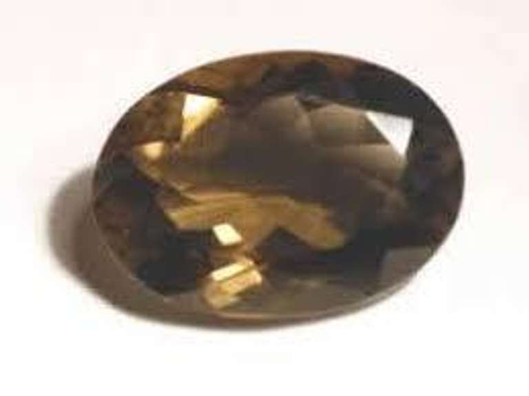 5X7MM OVAL SMOKEY TOPAZ