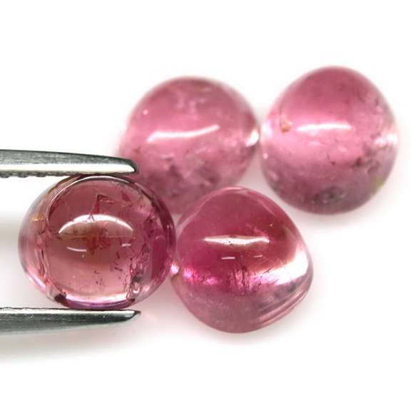 Dynamic 7.65ct Pink Tourmaline cabochon set
