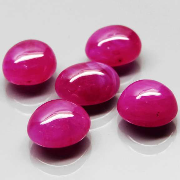 Heated only! 15.64ct top pinkish red Ruby cabochon set