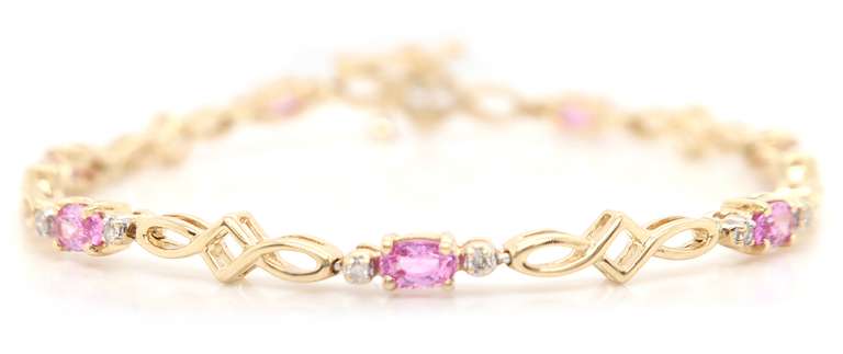 Handsome Yellow Gold pink Sapphire and Diamond Tennis Bracelet