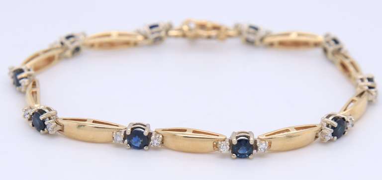 Magnificent Yellow Gold Sapphire and Diamond Lined Bracelet