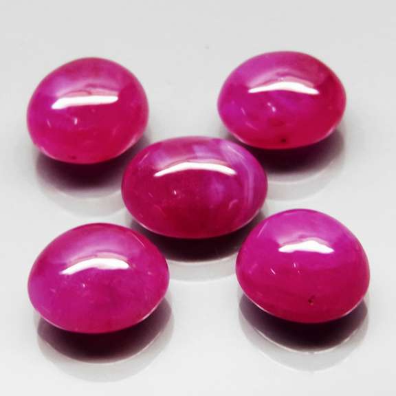 Heated only! 15.64ct top pinkish red Ruby cabochon set