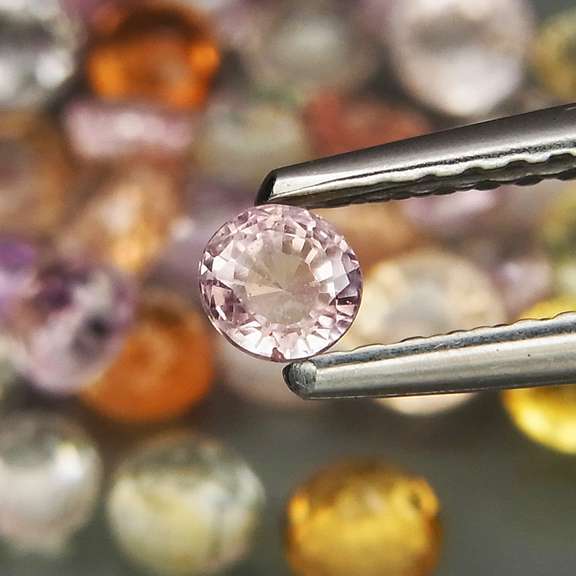 Vibrant 9.93ct diamond cut Ceylon Sapphire set