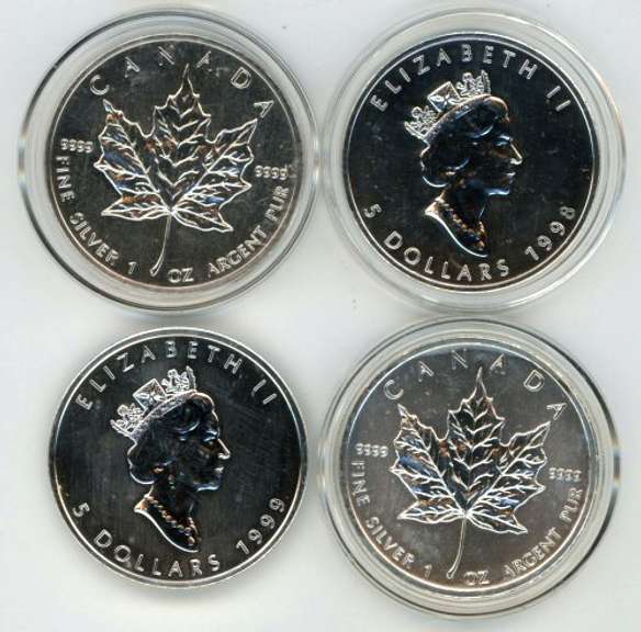 4 Diff. Canada pure .9999 Silver 1 oz Maple Leafs. Capsules