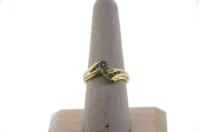 Pretty Oval Cluster Diamond Ring with Channel Set Diamonds and 14k Gold