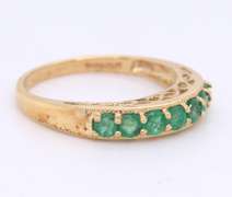 Fantastic Yellow Gold Emerald Shared Prong Band