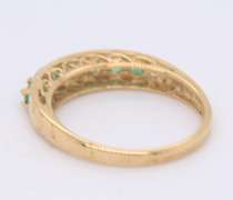 Fantastic Yellow Gold Emerald Shared Prong Band
