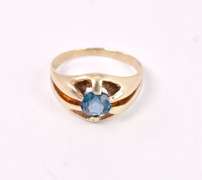 Brilliant Blue Topaz Ring in Yellow Gold