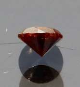 Eye catching 0.22ct round cut red Diamond solitaire