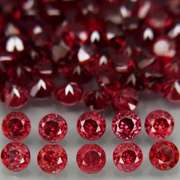 Incredible 7.11ct open color Pyrope Garnet set