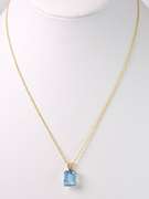Brilliant Blue Topaz Pendant Necklace in 14K Yellow Gold