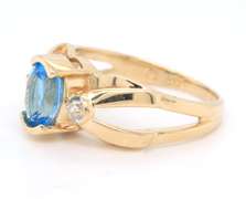 Favorite Yellow Gold Blue Topaz and Diamond Half Bezel Ring